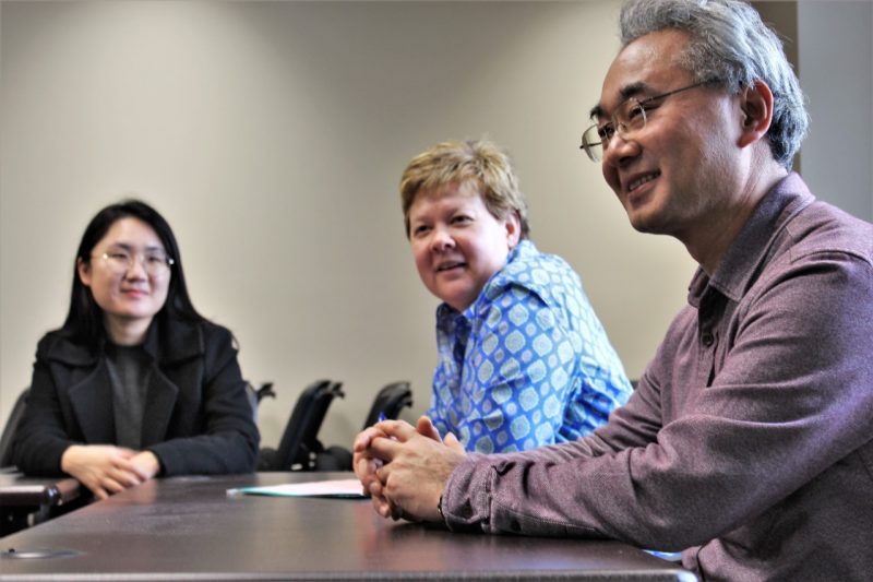 Nagoya University Professor Tadashi Sonoda meets with Associate Professor Susan Chen and graduate student Minkyong Ko.