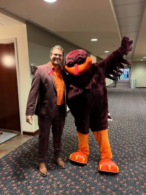 Normand Adams with the HokieBird at the Dept. of Agricultural and Applied Economics Career Fair in 2022