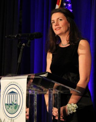 Lindsay Reames, the executive vice president of sustainability and external relations for Maryland and Virginia Milk Producers Cooperative, speaks at a Virginia Agribusiness Council legislative appreciation banquet. Photo courtesy of Taylor Mickleberry.